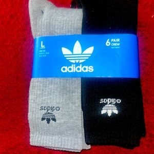 6 pair adidas crew socks.